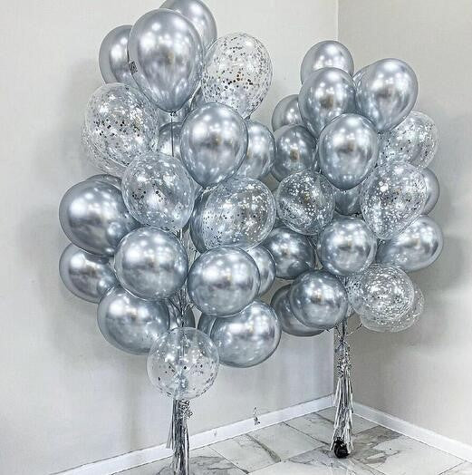 Bunches of Clear with silver confetti and chrome Silver balloons with tassels