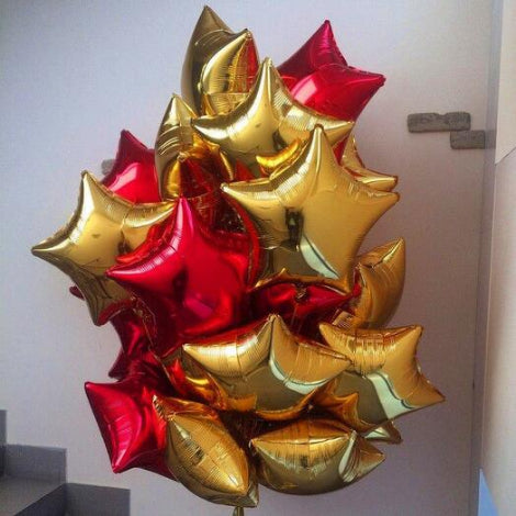 Bouquet of red and gold star-shaped balloons.