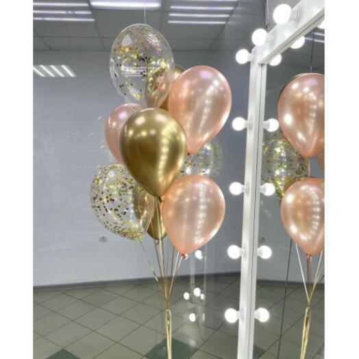 bunch of latex balloons in gold, rose gold, and clear with confetti
