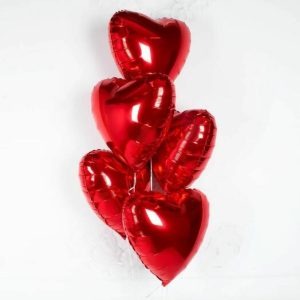 CLUSTER OF RED HEART FOIL BALLONS