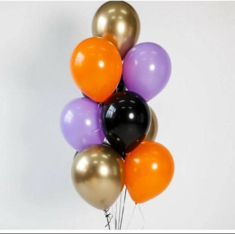Bouquet of latex balloons in gold, orange, purple, and black 