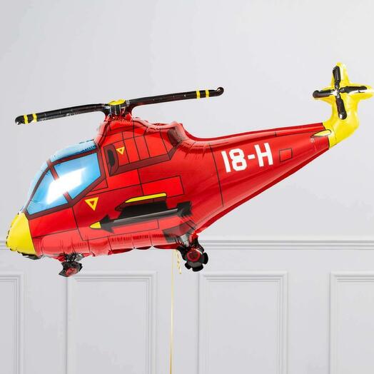 Red helicopter-shaped balloon with yellow accents 
