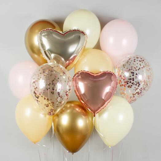 Balloon bouquet with heart-shaped balloons in rose gold, silver and some latex balloons in gold, pink, cream and white colours
