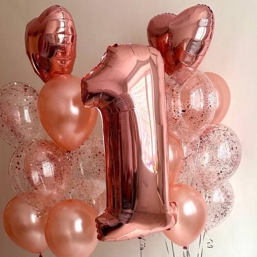 Rose gold number '1' balloon with other balloons 